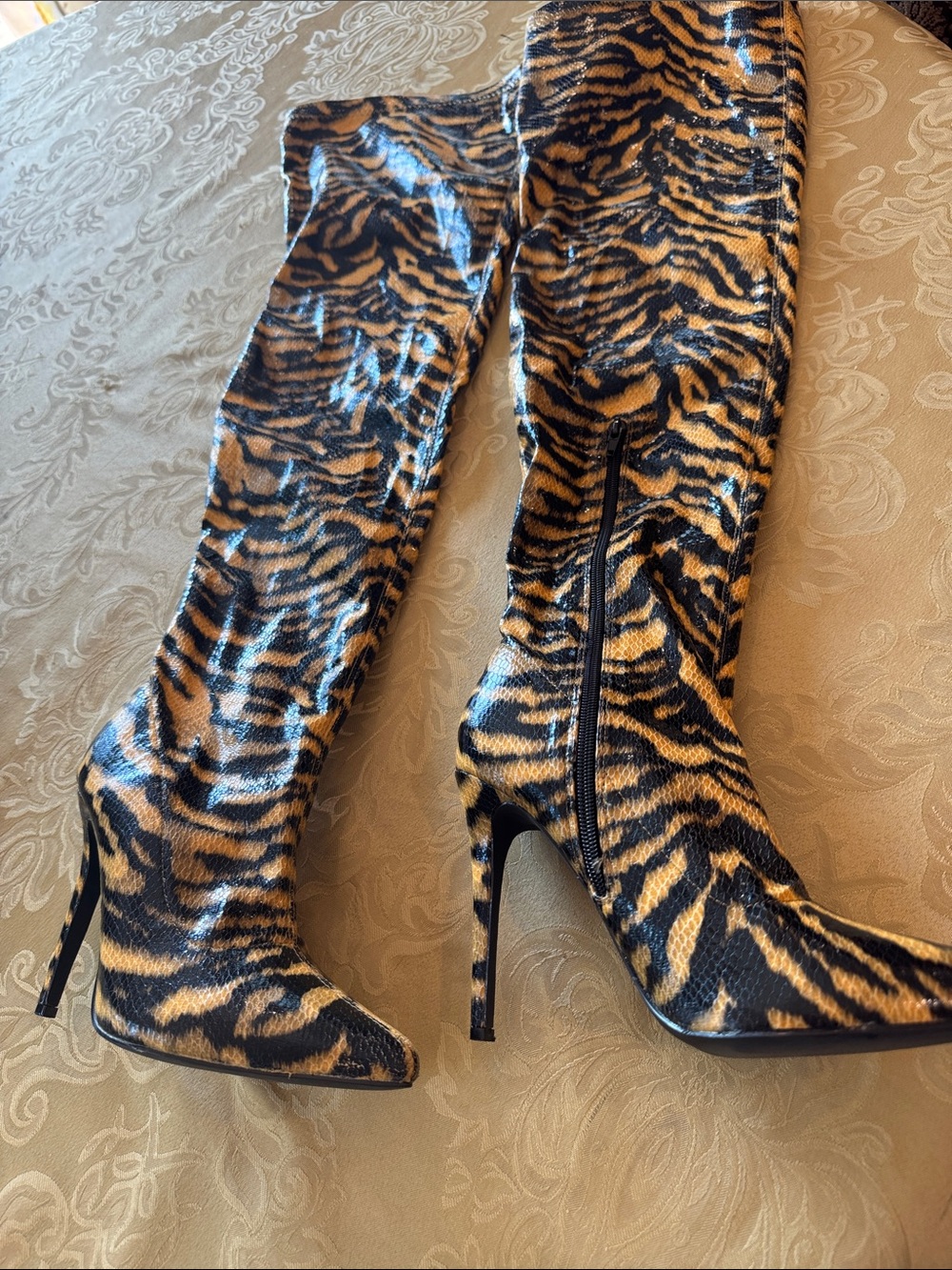 Fashion Nova tiger-print thigh-high boots size 9